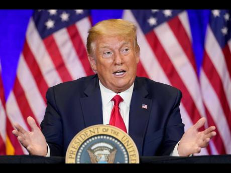 President Donald Trump participates in a Latinos for Trump Coalition round-table at Treasure Island Hotel & Casino, Sunday, September 13, 2020, in Las Vegas.