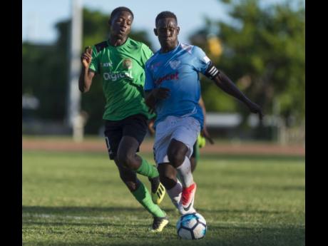 Action between Calabar High School and St Catherine High School during an ISSA Walker Cup game at Stadium East on Thursday, November 1, 2018.
