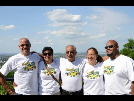 D.K. Duncan flanked by four of his children (from left): Keith, Patricia, Donna and David.