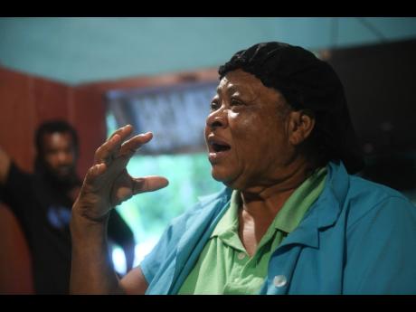 Credit: Ricardo Makyn/Chief Photo Editor Navlette Pryce, 73, speaks about her experience and fears living in the community, which is hard to access due to bad roads and cut off by the Juan De Bolas River after heavy showers.