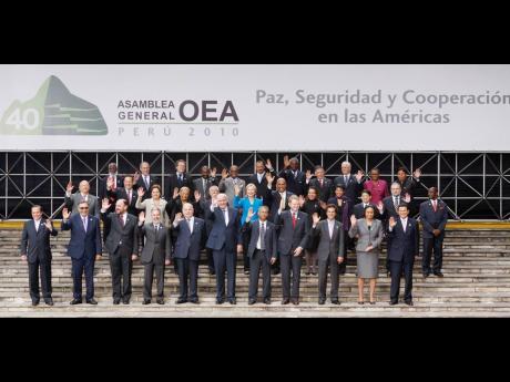 
In this 2010 photo Jamaica’s Ambassador to the United States, Audrey Marks (fourth right, second row), with foreign ministers and officials pose for the official photo of the 40th General Assembly of the Organization of American States in Lima, Peru. Th