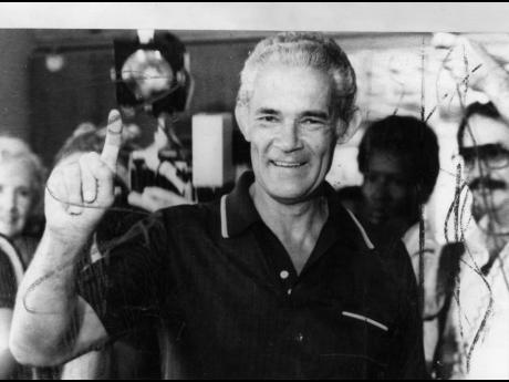 Credit: Gleaner Archive Photograph Prime Minister Michael Manley in the process of casting his vote at Annette Crescent in St Andrew North Central on October 30, 1980.