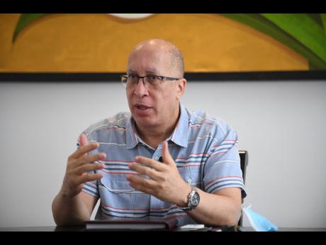 Credit: Gladstone Taylor/Multimedia Photo Editor Political historian and former PNP senator Delano Franklin recalling events during the island’s bloodiest election in 1980.