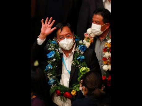 President-elect Luis Arce arrives to receive his presidential credential from the Supreme Electoral Court in La Paz, Bolivia, Miercoles, October 28, 2020. A final official vote count gave Arce a smashing victory, a vindication for the Movement Toward Socia