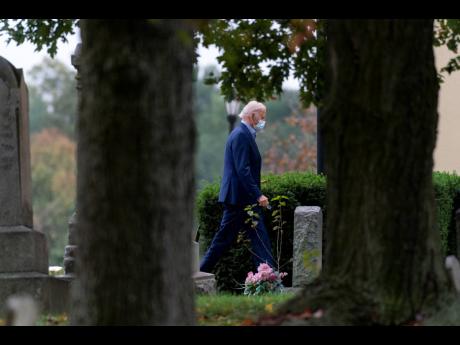 Democratic presidential candidate former Vice President Joe Biden arrives at St Joseph On the Brandywine Roman Catholic Church in Wilmington yesterday. (AP)
