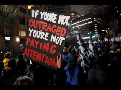 People march on the night of the election in Seattle, USA. 