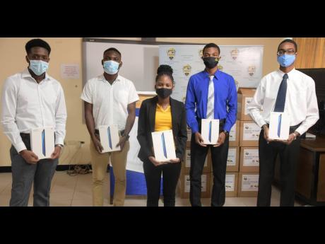 High achievers from the School of Computing and Information Technology (SCIT) at the University of Technology, from left, Dylan Lewis, Alex Downer, Alecia Bailey, Chadan Huggup and Cassandru Bartley, who were awarded the Huawei Seeds for the Future-SKY 202