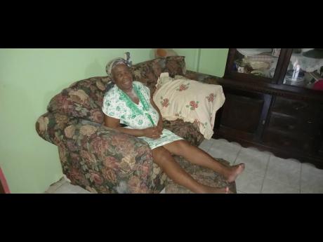 Estel Williams seeks help to repair a section of her house which was affected by the recent heavy rainfall.