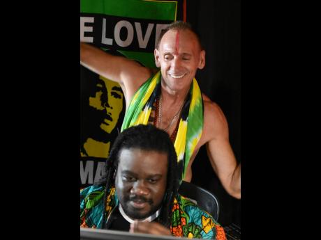 
Marked with a Chandan Tika, Roberts worked with Dale ‘Dizzle’ Virgo (foreground), who co-produced the 16-track album. 