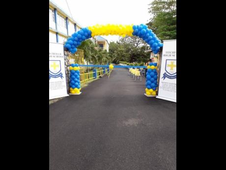The newly paved Lloyd O. Chin Drive at Titchfield High School in Port Antonio, Portland. 