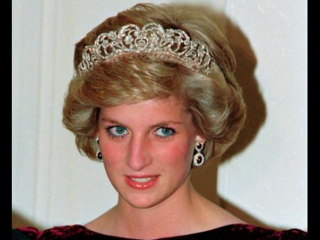 Credit: The Associated Press In this file photo dated November 7, 1985, Britain’s Princess Diana wears the Spencer tiara as she and Prince Charles attend a state dinner at Government House in Adelaide, Austraila. The BBC’s board of directors has announced on Wednesday the appoi