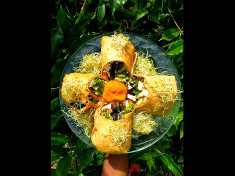 ABOVE: The pan-seared chicken and black bean wraps come with a signature pumpkin-cauliflower ‘cheese’ sauce.