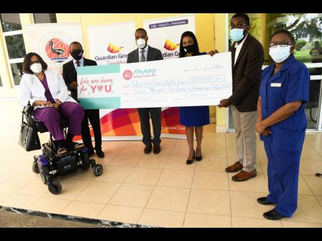 (From left) Dr Hyacinth Harding-Goldson, consultant anaesthetist, University Hospital of the West Indies (UHWI); Courtney Campbell, president and CEO, Victoria Mutual Group; Dr Carl Bruce, medical chief of staff, UHWI; Judith Forth-Blake, group chief custo