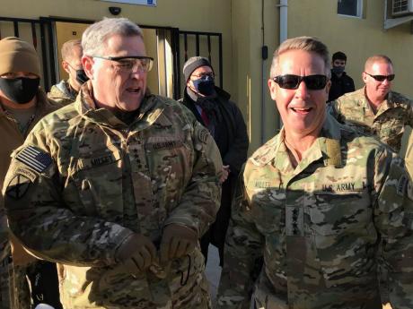 Chairman of the US Joint Chiefs of Staff General Mark Milley (left) talks with General Scott Miller, the commander of US and coalition forces in Afghanistan, on Wednesday.