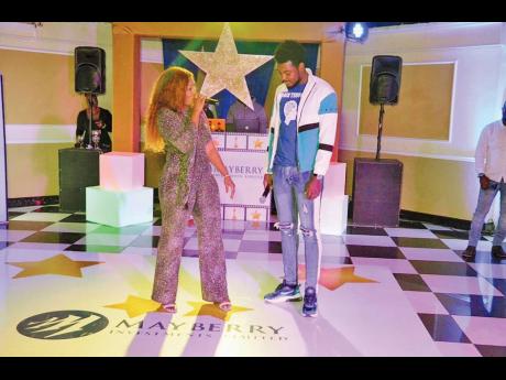 Entertainers Shuga and Devin Di Dakta give an impressive performance during the 2019 Mayberry Christmas party. 