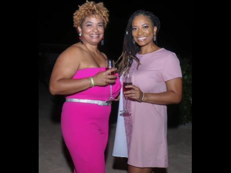 Kiana Case (left) and Kymoya Case were vibrant and playful dressed in shades pink and mauve.