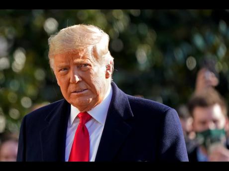 President Donald Trump walks to board Marine One on the South Lawn of the White House on Tuesday, January 12, in Washington. He was traveling to Texas. 