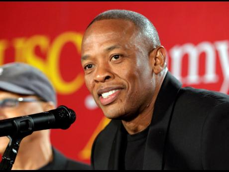 Credit: AP Music mogul Dr Dre is back at home and in studio after being treated at a Los Angeles hospital for a reported brain aneurysm.