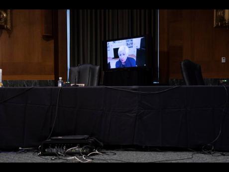 Treasury Secretary nominee Janet Yellen appears virtually during a confirmation hearing before the Senate Finance Committee on Capitol Hill, Tuesday, January 19, 2021, in Washington.