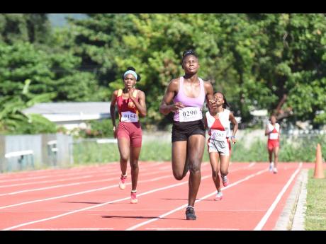 Vere Technical High School’s Amanda Thrue wins the Class One girls’ 800m race at the Tyser Mills Classics at Calabar High School on Saturday, December 12, 2020.