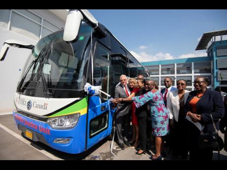 Credit: File
The ribbon cutting ceremony for the handover of two mobile justice unit buses at the Ministry of Justice in January 2020. The vehicles were funded by the Canadian Government in partnership with the United Nations Development Programme.
