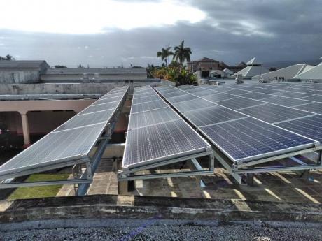 Credit: Contributed Freshly installed solar panels on the roof top of the May Pen Hospital in 2020 in preparation for commissioning.