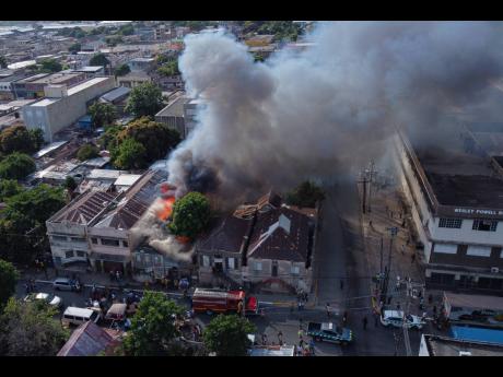 Fire in the heart of the Kingston capital on December 23, 2020. Insurance penetration is low among businesses for fire and other damage.
