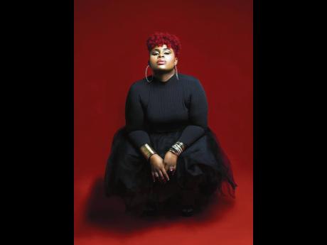 When she’s not adding harmonies, virtually, from her home studio, Sherieta Lewis is focusing on her budding career in real estate. 