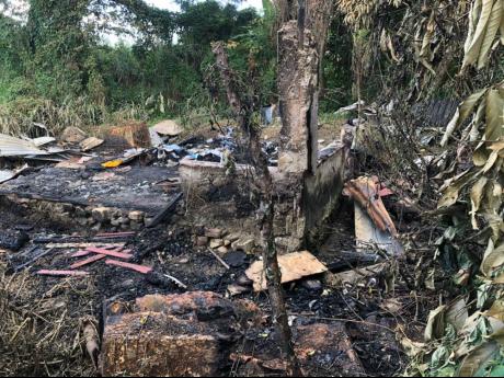 Credit: Photo by Gareth Davis The remains of Ann Marie Livingston’s house which was destroyed by a fire last week.