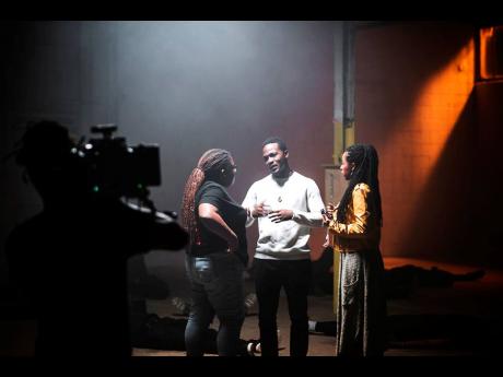 From left: Film director Kelly Fyffe-Marshall consults with poet Komi Olaf and actress Donisha Prendergast behind the scenes of 'Black Bodies'. 