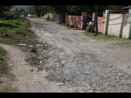 Credit: Photo by Christopher Serju Alamando Terrace in New Haven, St Andrew, bears evidence of the havoc wreaked by torrential rainfall.