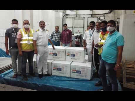 Credit: ANI In this February 8 photograph, COVID19 vaccination doses of the Serum Institute of India bound for Barbados and Dominica are being loaded. The vaccines were sent under India’s Vaccine Maitri (vaccine friendship) programme. Ani
