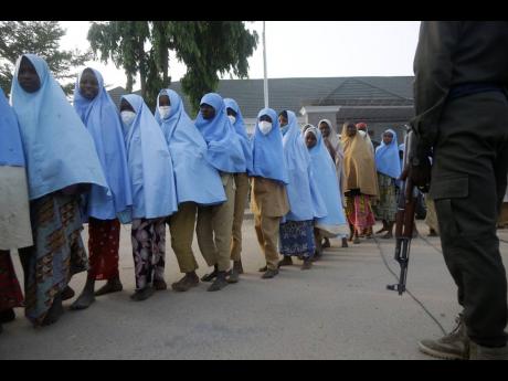 Some of the students who were abducted by gunmen from the Government Girls Secondary School, in Jangebe, last week after their release meeting with the state Governor Bello Matawalle, in Gusau, northern Nigeria, yesterday.