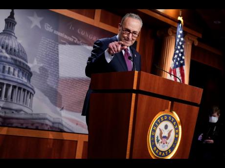 Credit: AP
Senate Majority Leader Chuck Schumer speaking during a news conference after the Senate passed a COVID-19 relief bill in Washington on Saturday.