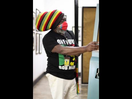 Ricky Chaplin, recording artiste and one of the Bob Marley Museum’s tour guides, gives us a peek into the reggae icon’s restored Land Rover. 