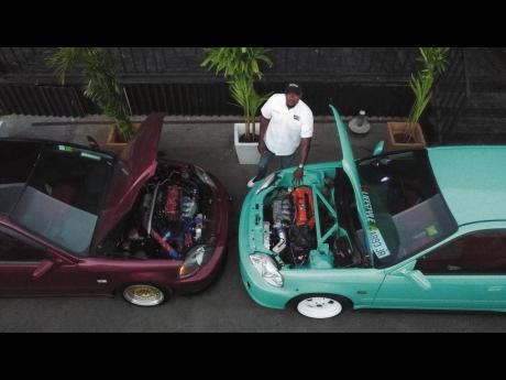 Two cars that were worked on by Lee Sing.  