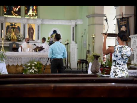 Easter service at the Kingston Parish Church in downtown Kingston on April 4.