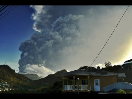 Credit: AP Ash rises into the air as the La Soufriére volcano erupts on the Eastern Caribbean island of St Vincent yesterday.