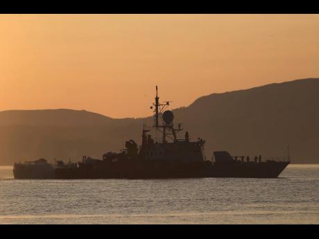 An Indonesian navy patrol ship returns after a search operation for submarine KRI Nanggala that went missing while participating in a training exercise on Wednesday, off Banyuwangi, East Java, Indonesia Sunday, April 25.
