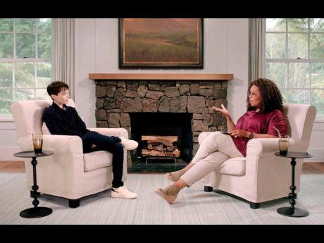 Elliot Page (left), with Oprah Winfrey during an episode of ‘The Oprah Conversation’, an interview series on Apple TV+. Page is revealing how happier he feels after having top surgery and how important he believes it is to support health care for trans