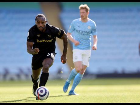West Ham’s Michail Antonio drives towards the Manchester City goal during their English Premier League match at the Etihad Stadium in Manchester, England on Saturday, February 27.