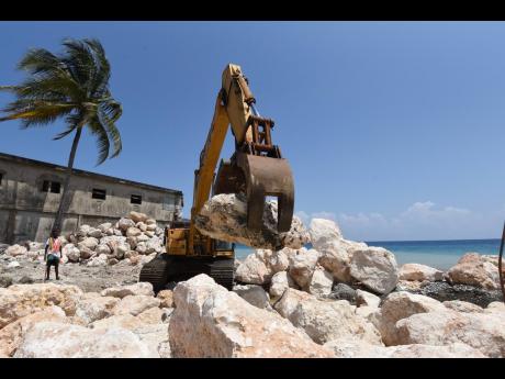 A seawall under construction in Buff Bay.