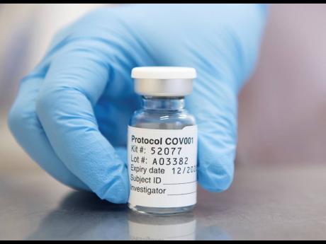 
This undated photo issued by the University of Oxford shows of vial of coronavirus vaccine developed by AstraZeneca and Oxford University, in Oxford, England. Pharmaceutical company AstraZeneca said Monday Nov. 23, 2020, that late-stage trials showed its 