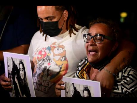 Keila Ortiz, the mother of Keishla Rodriguez, cries out for justice after boxer Felix Verdejo was arrested in connection with the death of her 27-year-old pregnant daughter whose body was found in a lagoon, outside FBI headquarters in San Juan, Puerto Rico