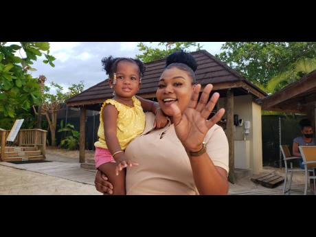 
Kerian Phillips with her daughter, Khalia.