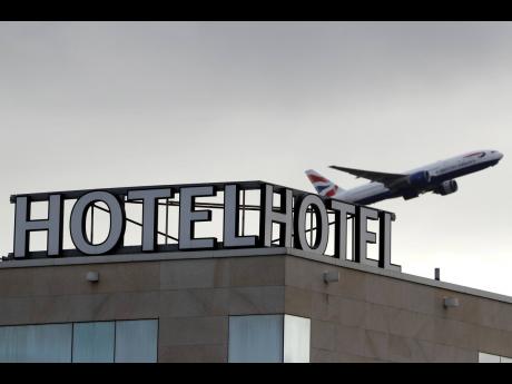A plane takes off from Heathrow Airport in London, England, on Friday, February 5, 2021.