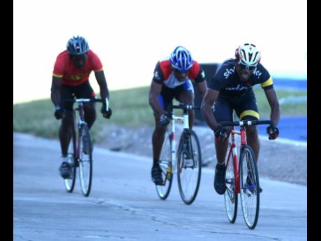 Credit: File Jamaica Cycling Federation president Dr Wayne Palmer (right) leads the pack at a development meet at the National Stadium Velodrome on Sunday, February 11, 2018.