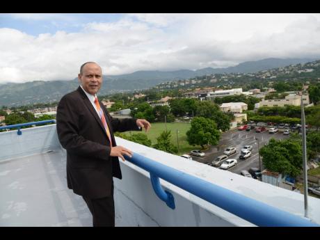 In this November 13, 2017 file photo, President of Guardian Life Limited Eric Hosin speaks about the company’s plans from the rooftop of the company’s New Kingston headquarters.
