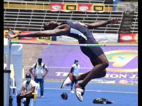 Jaidi James from Jamaica College on his way to winning the Class Three High Jump event with a clearance of 1.86 metres at the ISSA/GraceKennedy Boys and Girls’ Athletics Championships at the National Stadium on Thursday, May 13, 2021.
