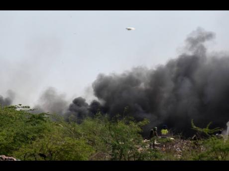 Smoke billowing from the Riverton landfill last Tuesday.